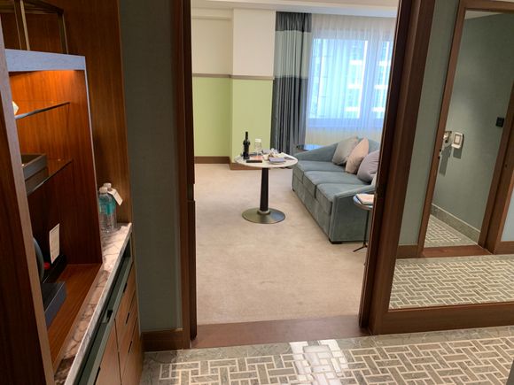 As you walk in you have the closet, mini bar, fridge on your left hand side. I loved their hangers - it was extremely nice and sturdy for winter coats. 