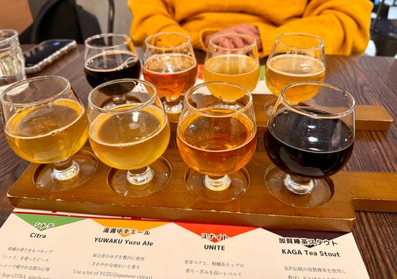 Trying the local taps, with pizza.