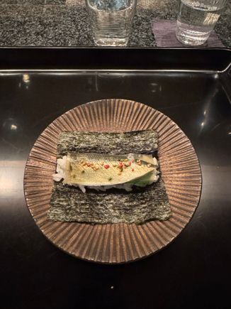 Silver fish wrap; not fishy at all; and well balanced with vinegar….