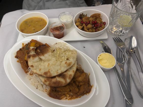 Chicken very tender and flavourful, naan soft and fresh.