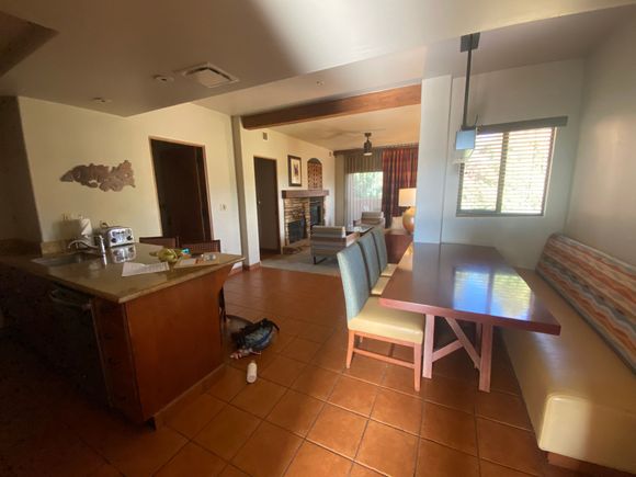 Living Room (w/gas fireplace) and dining area; kitchen is to the left.