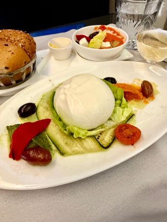 Handmade burrata
Basil and tomato pesto, courgette cream, olive confit.