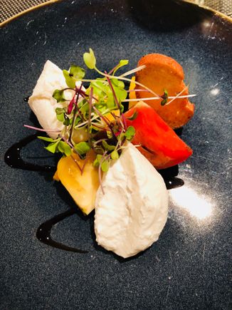 Poached white peach and honey black pepper ice cream in the Concorde Room at Kennedy.