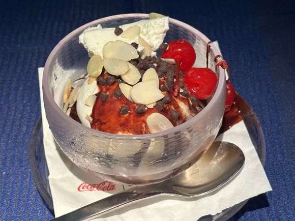 The sundae was at the right temperature for easy eating without having to fight the ice cream. Every time I order this, there's sauce on the outside. Makes for sticky fingers. I wish they would provide a wet wipe with this dessert option.