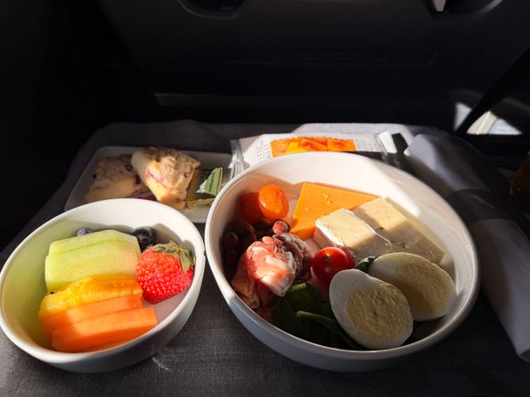 i wish the cheese had been room temperature (it was quite cold) but i was pleasantly surprised by the plate. three cheeses, smokehouse almonds, a few apricots, some greens, crackers and a couple kinds of meats along with a fruit plate and the ubiquitous ice cold scones. i'd get it again.