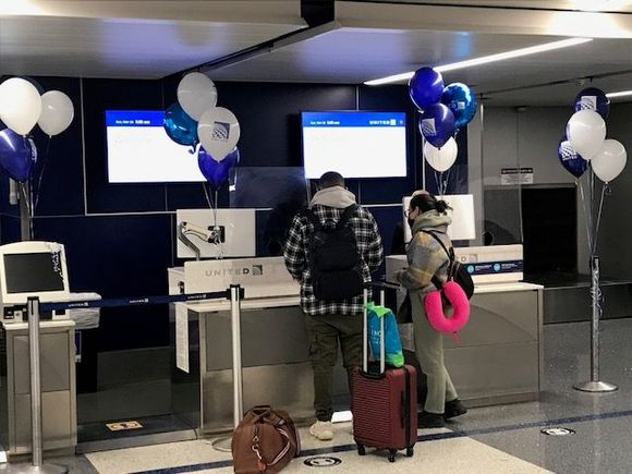 At Premier check-in