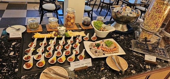 Interesting nibbles - on this day, octopus, to go with cereals and cold cuts