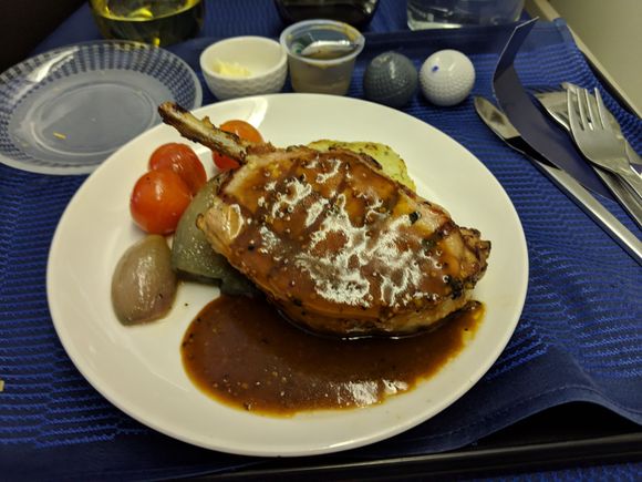 Grilled pork chop with mustard demi-glace