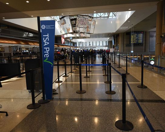 TSA Pre-Check is on your left hand side. 