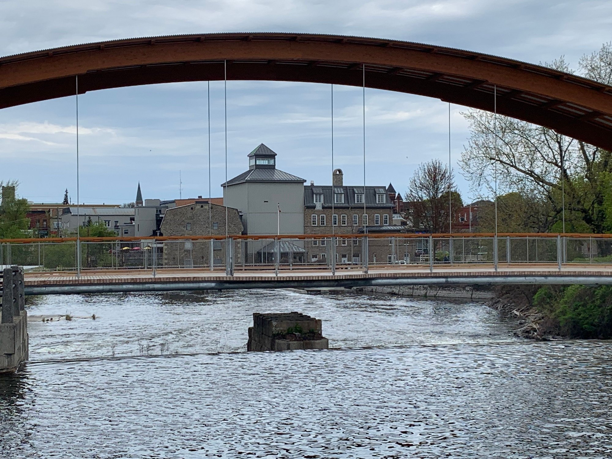 Downtown Smiths Falls visible past the dam