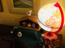 Molly hanging out in the rocker. The tree. And my daughter’s nativity set. If you look closely there is a polar bear. She used to add a whole menagerie when she was little: giraffes, cats, dogs, a bear, elephant, etc. I still throw the polar bear in for old time’s sake. 