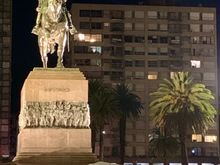 The main plaza in downtown Montevideo at night