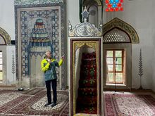 Our guide showing up one of the local mosques.  It was beautiful.  The Ottomans stormed right up through the middle of Bosnia - Herzegovina and the locals were not taxed if the converted to Muslim. No taxes...must be the first Reagan Revolution