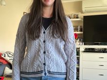 Wearing the Taylor Swift cardigan.