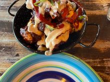 Our chicken wings at Amigos - smothered in delicious stuff!