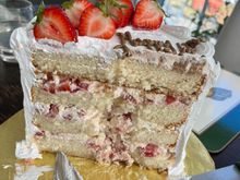 4 layer vanilla cake with strawberry filling