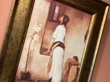 I loved this photo in the lobby of the Guesthouse -- I ws told that its from 100 years ago when females were not allowed out of the house so this young woman tries to peer out.