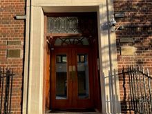 This is the door that Princess Diana and Princess Kate came out holding up their babies to show the world.  An heir and a spare!  It's right on the road called the Wharf Road and it's very non-descript, not Royal at all