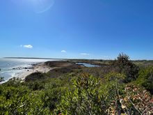 Pond, ocean and sky.