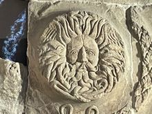 Here is a close up of the Medusa like head in the pediment except it'a male