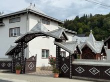 The ubiquitous wooden fences and gates found throughout Romania. The fancier gates signify wealth. 