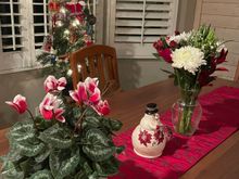 My Christmas table. I kind of hate leaving my flowers. I have a full sized tree in the living room, my little tree has mainly travel ornaments