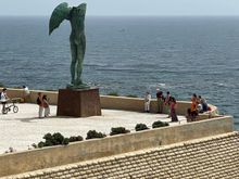 Statue outside the castle by Polish artist Mitoraj