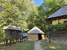 Another homestead - the structure on the left is to house animals - chickens, I think. 