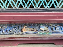 The Shrine is surrounded by this fence that has the exquisite carvings of animals all around