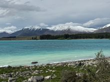 We love this lake with its turquoise waters and snow-capped mountains!