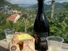 Osteria Senz-Oste, a self-service tasting venue was a one of many recommendations from the owner of our accommodation. Buy your wine, water and snacks from vending machines, and find a seat among the vines