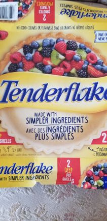  First you cheat on the pie crust. There are  2 bottom layers but you roll one layer out and  use the  layer  for the top  and then  make slits to vent  the top layer.