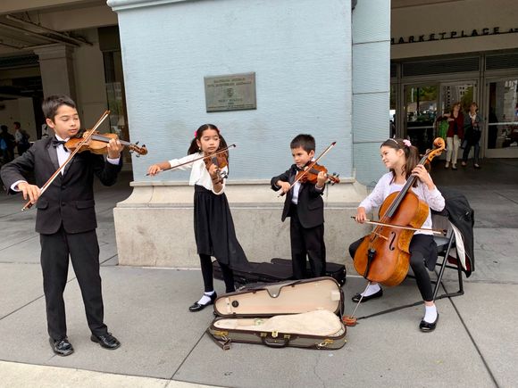  This accomplished young quartet outside the Farmers Market was raking in the dough. And deservedly so. 