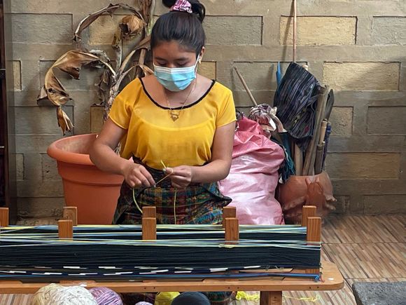 Learning about weaving at a cooperative on the lake.