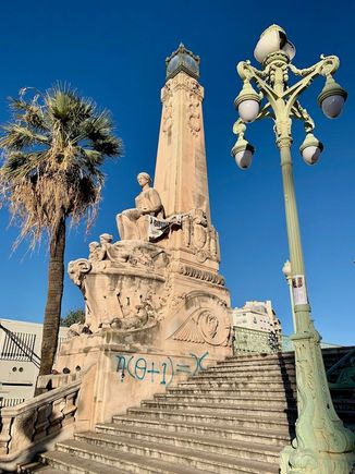 Statues represent destinations to which people sailed from the port