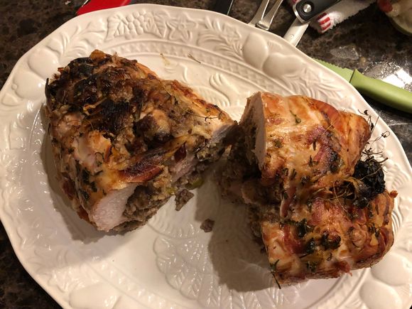 
Almost forgot to take the picture,.  Remembered as I was cutting it and called to DS2 to take one quick!   It was rather impressive looking coming out of the oven but I would not make i it again. 