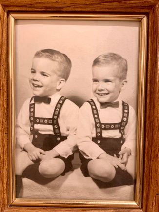 Me on the right (I think). Actually you can tell us apart by the hair parts. They are on opposite sides typical of identical twins. He started out as left-handed but they made him right handed to be like his (7 minute older) big brother,  lol.