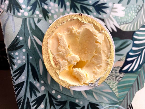 Very thick & rich.  A spoon would easily stand in this pot.