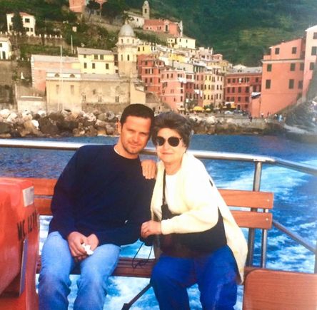 Leaving Vernazza by boat (right before mom put her scarf around her head to hold on her wig). 