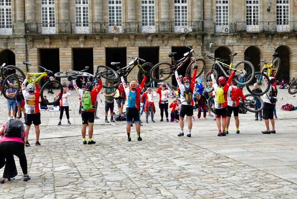Bikers in the main square in front of the Cathedral celebrating completion of the Camino Way.