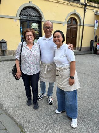 A photo of me with Ricardo and Olivia from Trattoria Nona Clara. They are the two very nice wait staff who befriended our daughter and her family.
