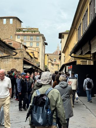 Walking across the Ponte Vecchio