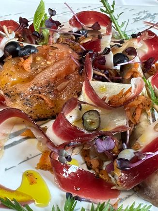 The peeled and roasted tomato near upper left left me bedazzled.   How can any tomato taste so sublime? The only info I got was that it was, yes, "peeled and roasted," and then added to the salad which contained ingredients from borage to blueberries.  Unforgettable!
A meat restaurants with some of the greatest salads I've ever sampled!  Bravo!