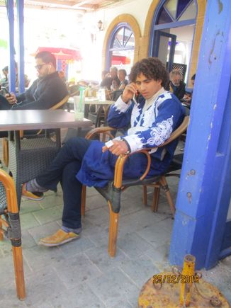 Guy at a café with a huge ring