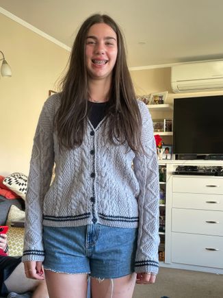 Wearing the Taylor Swift cardigan.