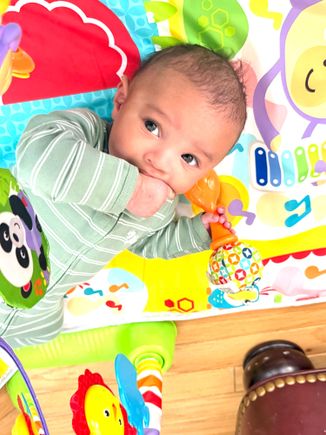 Kaleb loves to put as many fingers in his mouth as he can