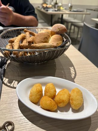 Complimentary fried potato balls