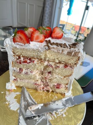 4 layer vanilla cake with strawberry filling