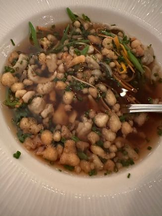 Beef consommé with spatzle of veal liver