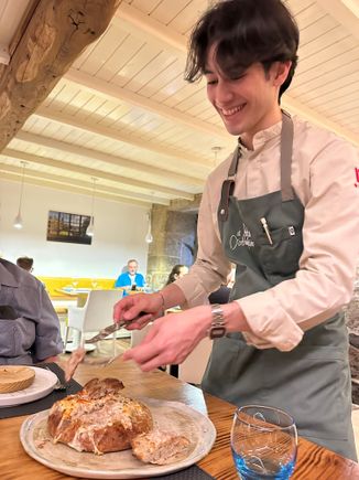 Portioning out the chestnut bread stuffed with chicharrones and Galcian cheese--my partner could not get enough of this!